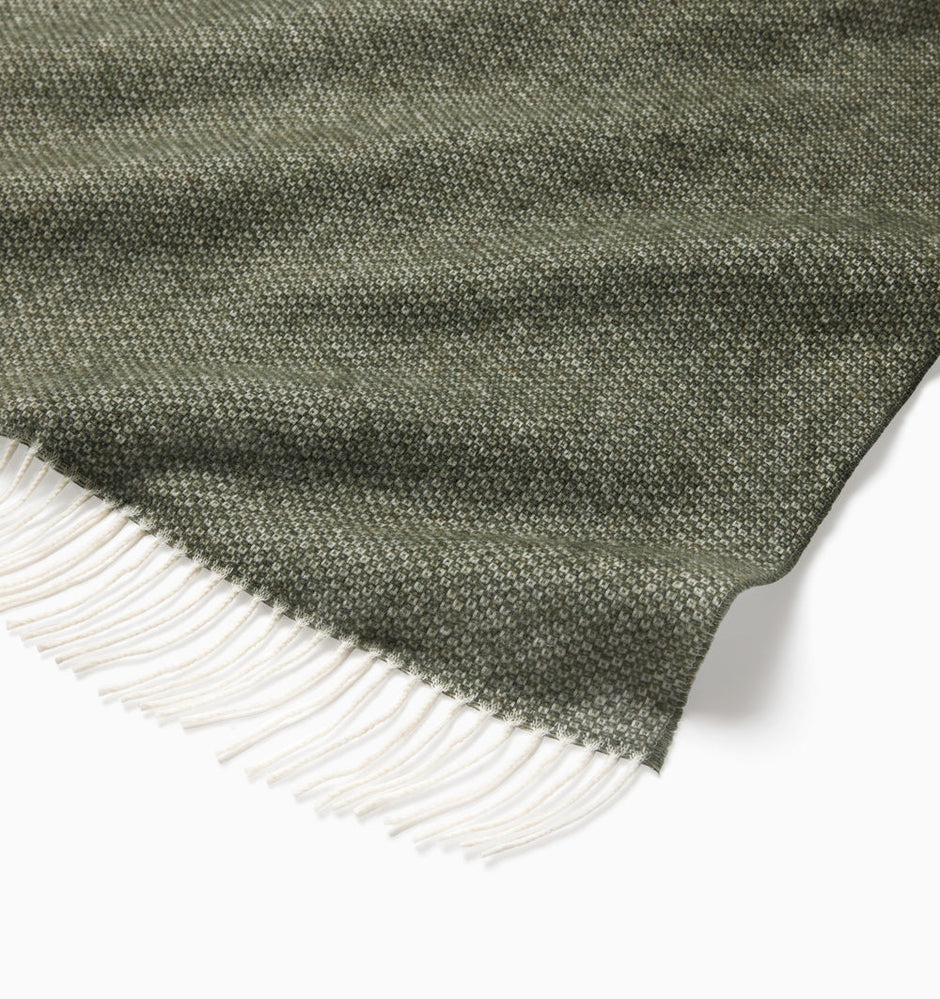 Beige Sferra Cervino throw blanket with soft, cozy fabric and elegant texture, perfect for adding warmth and style to a living space.