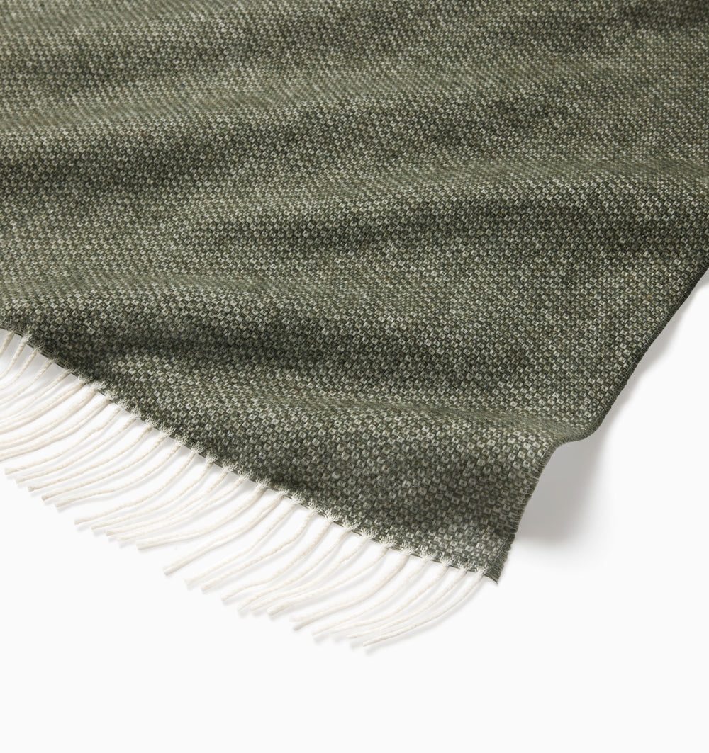 Beige Sferra Cervino throw blanket with soft, cozy fabric and elegant texture, perfect for adding warmth and style to a living space.