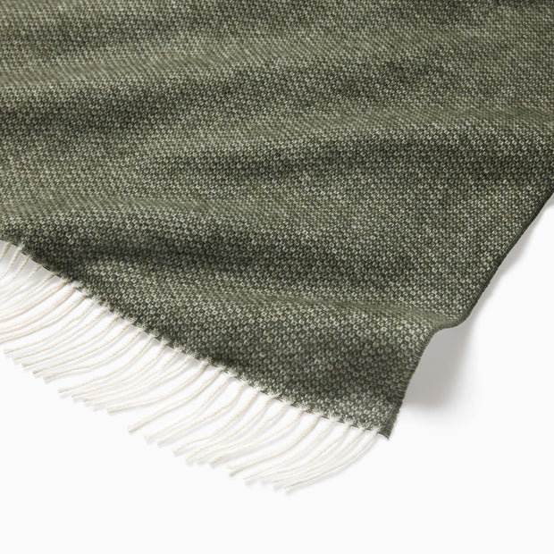 Beige Sferra Cervino throw blanket with soft, cozy fabric and elegant texture, perfect for adding warmth and style to a living space.