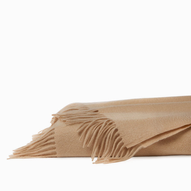 Sferra Dorsey throw in midnight, soft woven fabric with elegant texture, perfect for cozying up on a sofa or bed.