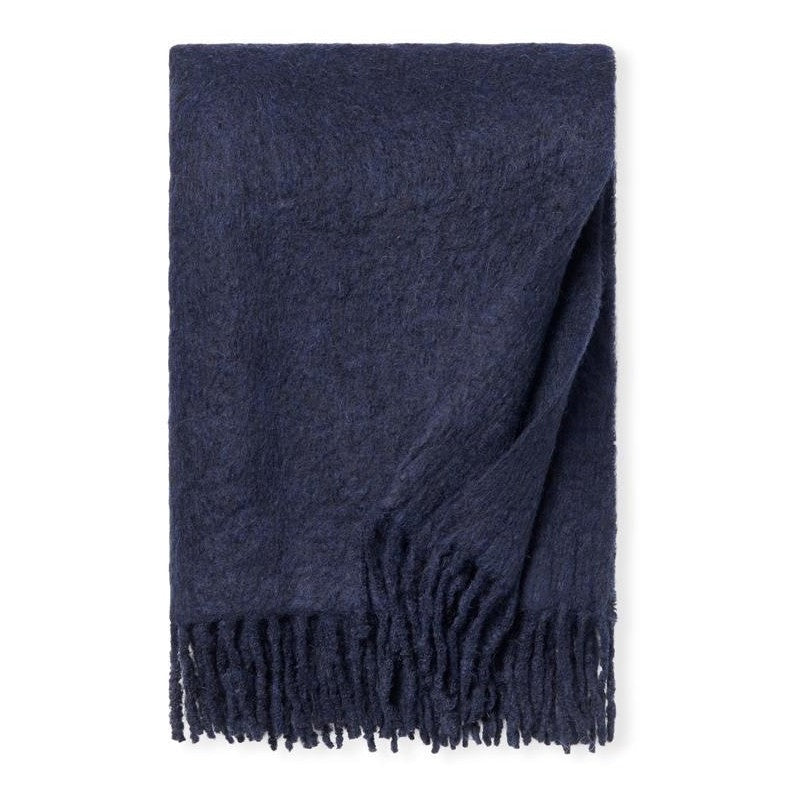 Navy Sferra Motta throw blanket with soft, cozy fabric and elegant design, perfect for adding warmth and style to your space.