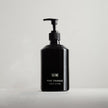Tatine Hand Lotion with pine and orange scent, creamy texture, and elegant packaging for nourishing hand care.