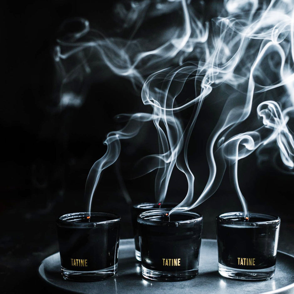 Tatine Stars Are Fire Classic Scented Candle with a decorative star-shaped design in a glass jar.