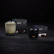 Tatine Stars Are Fire classic scented candle in a glass jar, featuring a warm, inviting flame and elegant design.