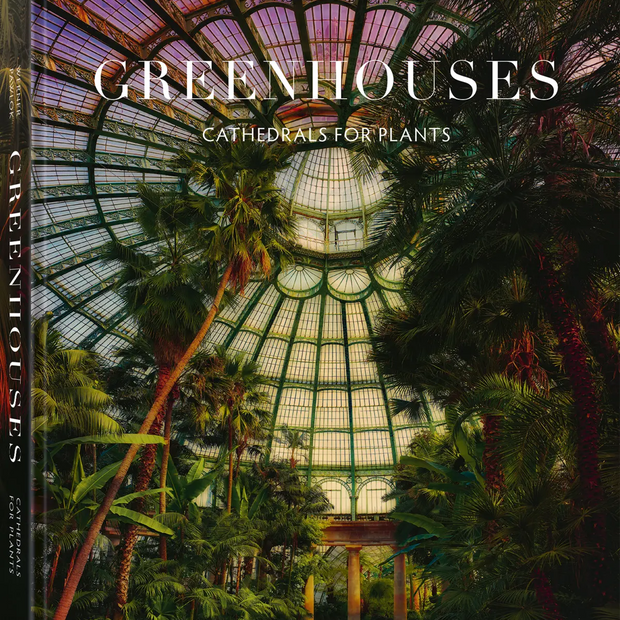 Decor book titled "Greenhouses: Cathedrals for Plants" by TeNeues, featuring images of elegant greenhouse designs for plant enthusiasts.