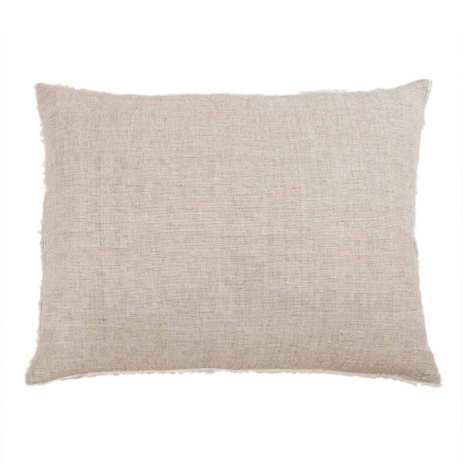 A rectangular-shaped throw pillow for top pof bed in a terracotta striped color in linen.