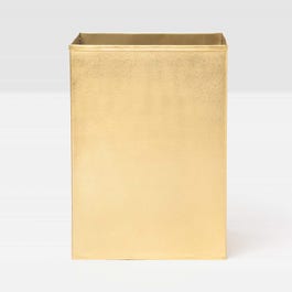 Gold rectangular wastebasket on a white background