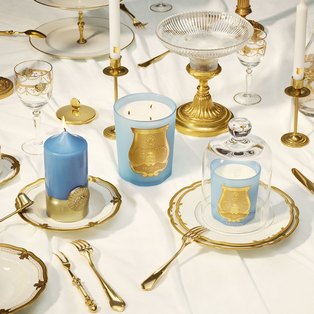 Trudon Solis Rex pillar candle with elegant white wax and simple design, featuring the brand’s subtle logo on the front.