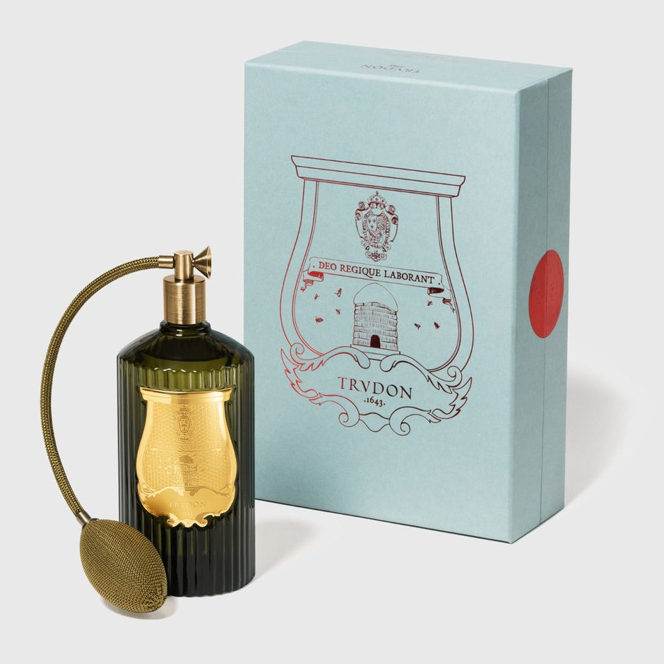 Trudon Abd el Kader room spray bottle with elegant label and silver cap, designed for freshening indoor spaces.