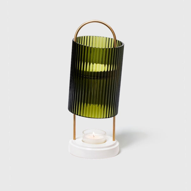 Trudon La Promeneuse scented candle box set with elegant packaging and a classic glass candle holder.