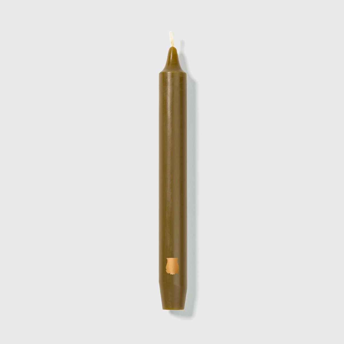 Set of six Trudon Madeleine taper candles in khaki color, elegant candle holders with a classic design.