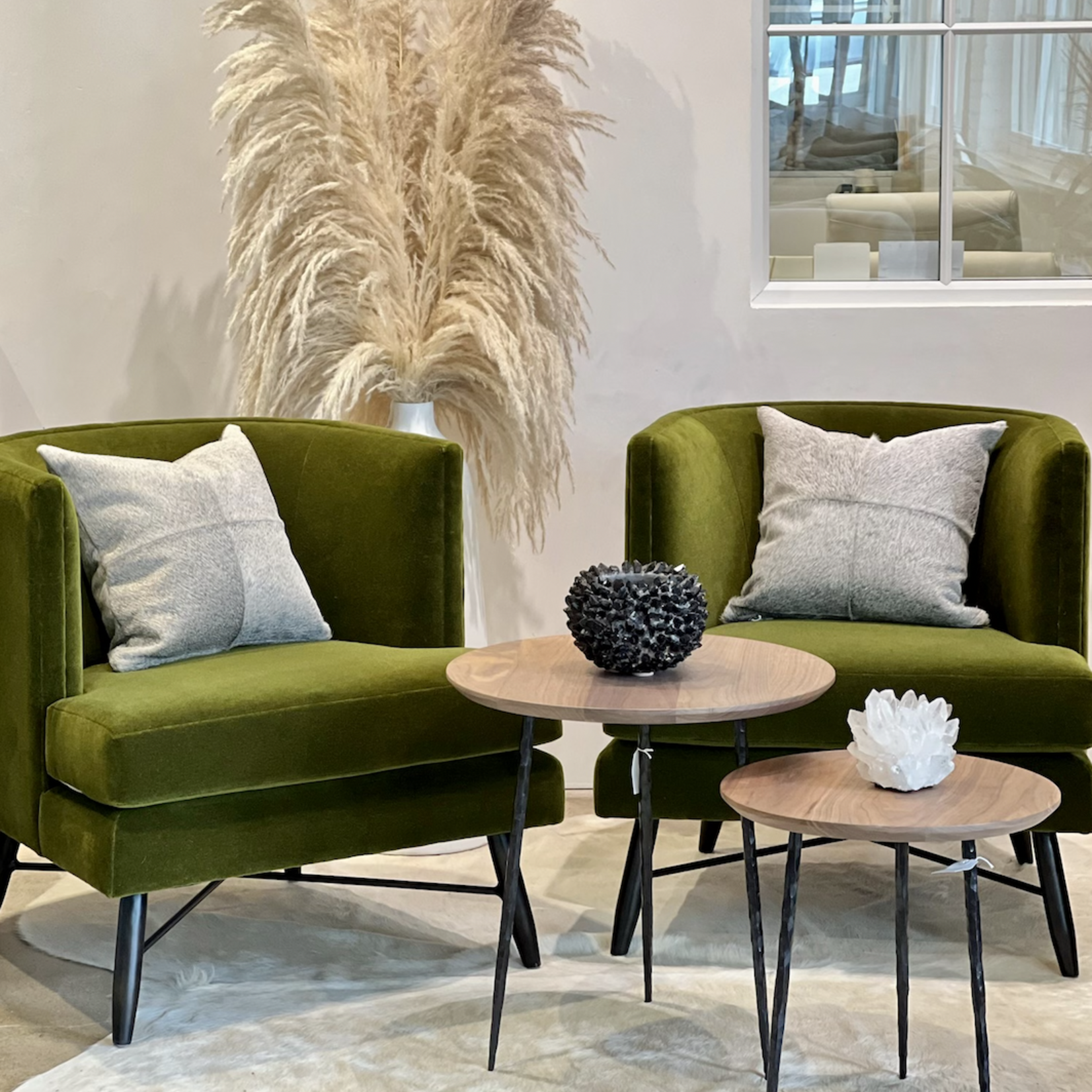 Pair of Verellen Giaco round nesting side tables set of 2 with wooden tops and sleek metal bases, ideal for living room use.