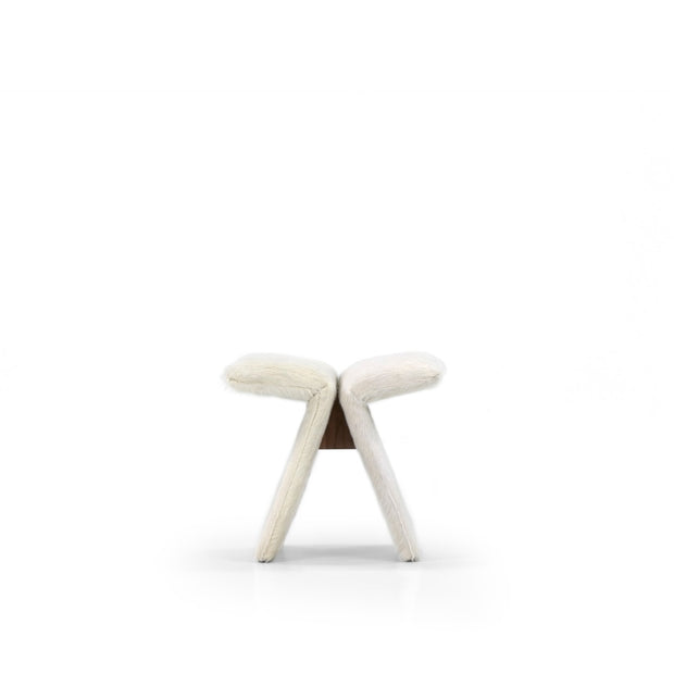 Verellen Butterfly Stool Moray Olive featuring a sleek, modern design with a vibrant olive green finish and smooth curves.