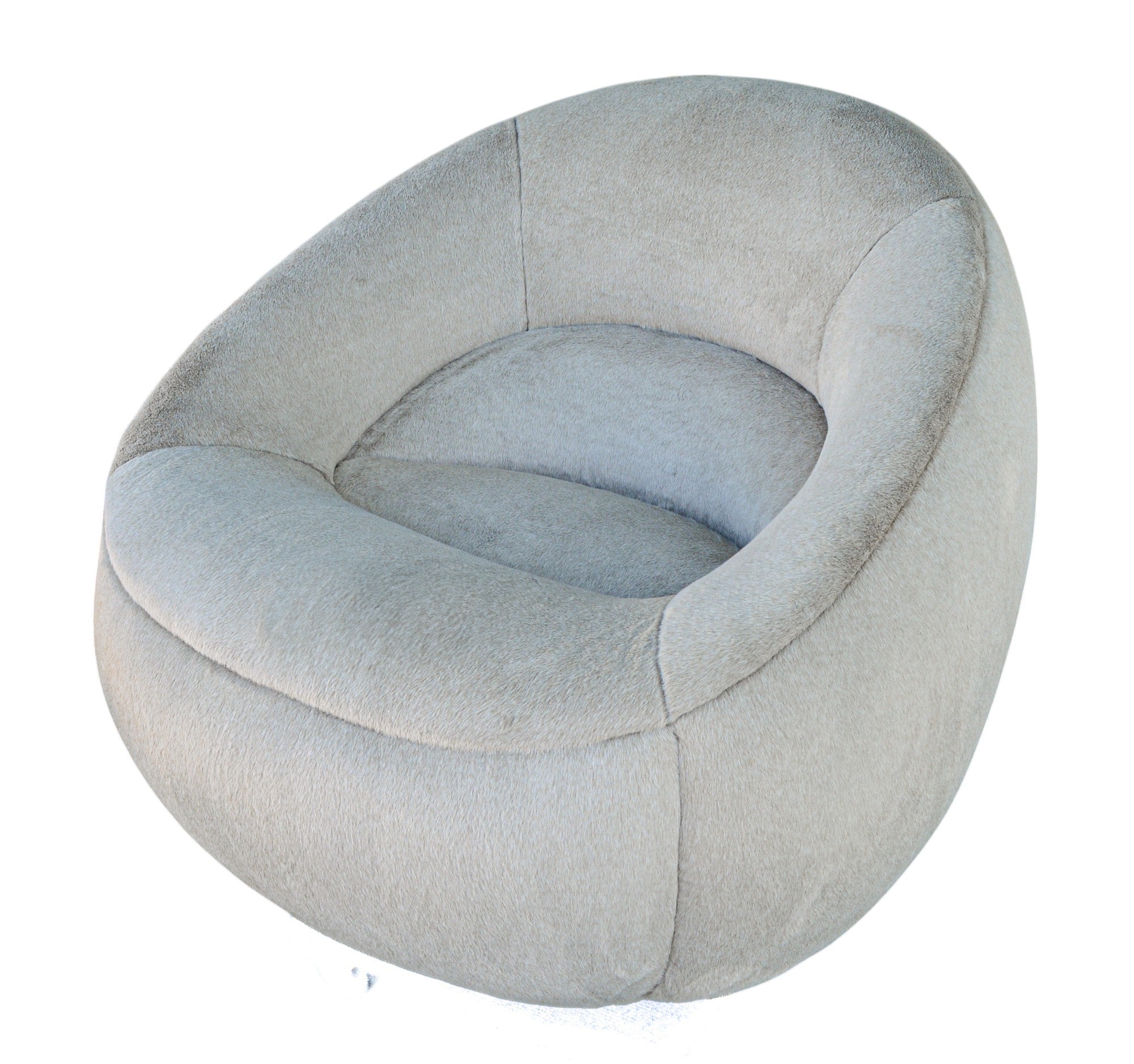 Verellen Micah swivel club chair in soft cashmere fawn fabric with a rounded back and swivel base.
