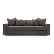 A dark green Verellen Gregoire sofa with a sleek, modern design featuring multiple cushions on a wooden frame, positioned against a white background.