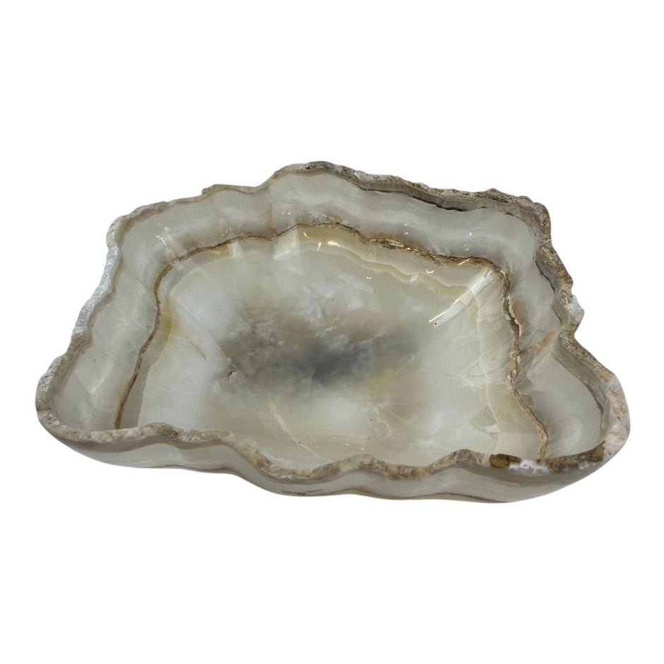 Cream and taupe onyx decor bowl by Verona Prive, elegant centerpiece with smooth, polished surface and modern design.