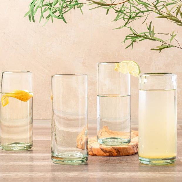 Set of clear handblown Mexican highball glasses by Verve Culture, showcasing smooth glassware with elegant, rounded shapes.