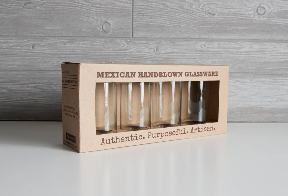 Handblown Mexican highball glasses by Verve Culture, clear glassware with a smooth, rounded design for refreshing drinks.