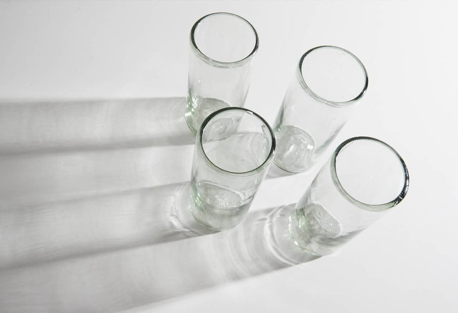 Set of clear handblown Mexican highball glasses by Verve Culture, showcasing their elegant, artisanal glassware design.