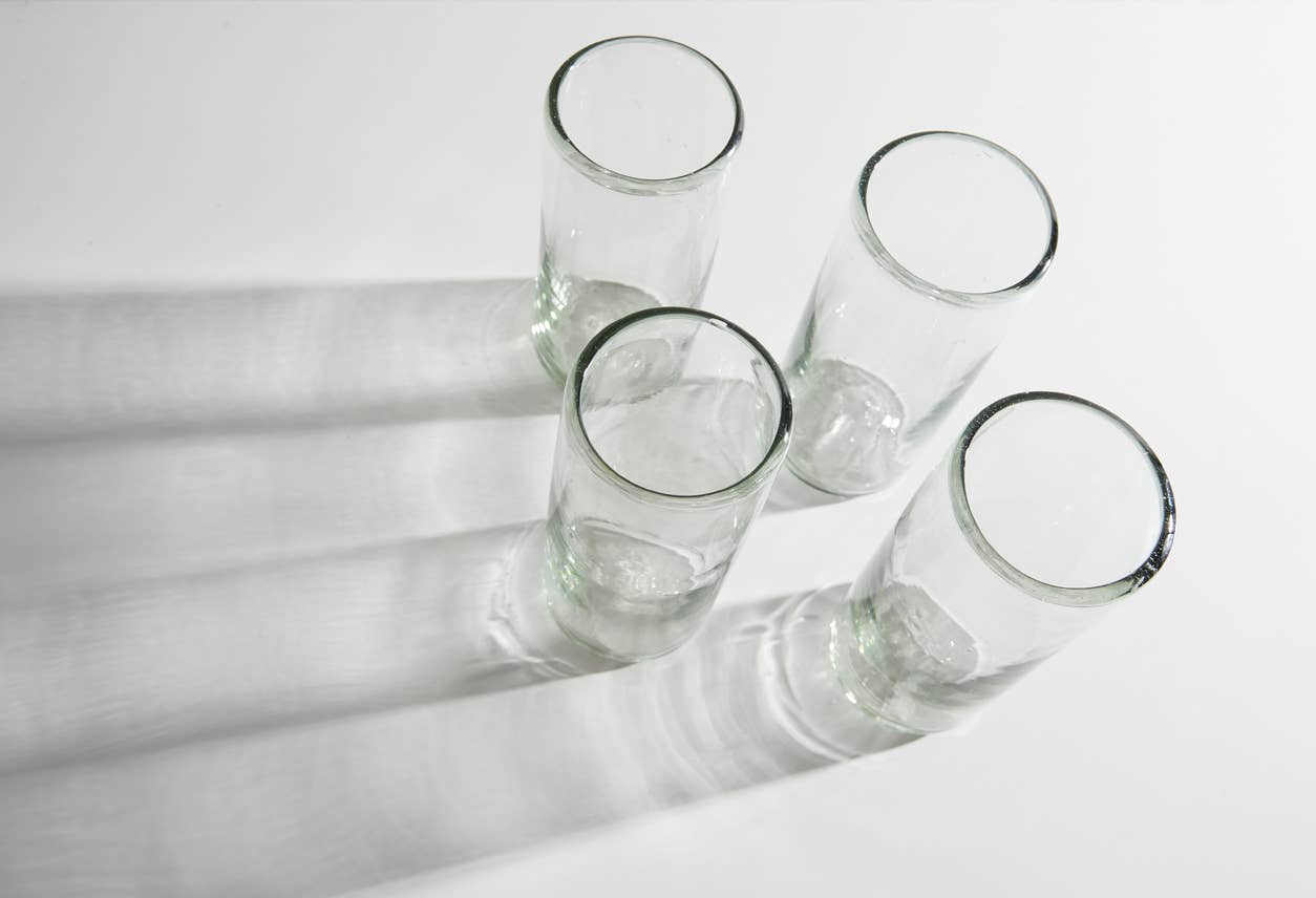 Set of clear handblown Mexican highball glasses by Verve Culture, showcasing their elegant, artisanal glassware design.
