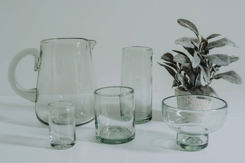 Clear handblown Mexican highball glasses by Verve Culture, showcasing their elegant, transparent glassware design.