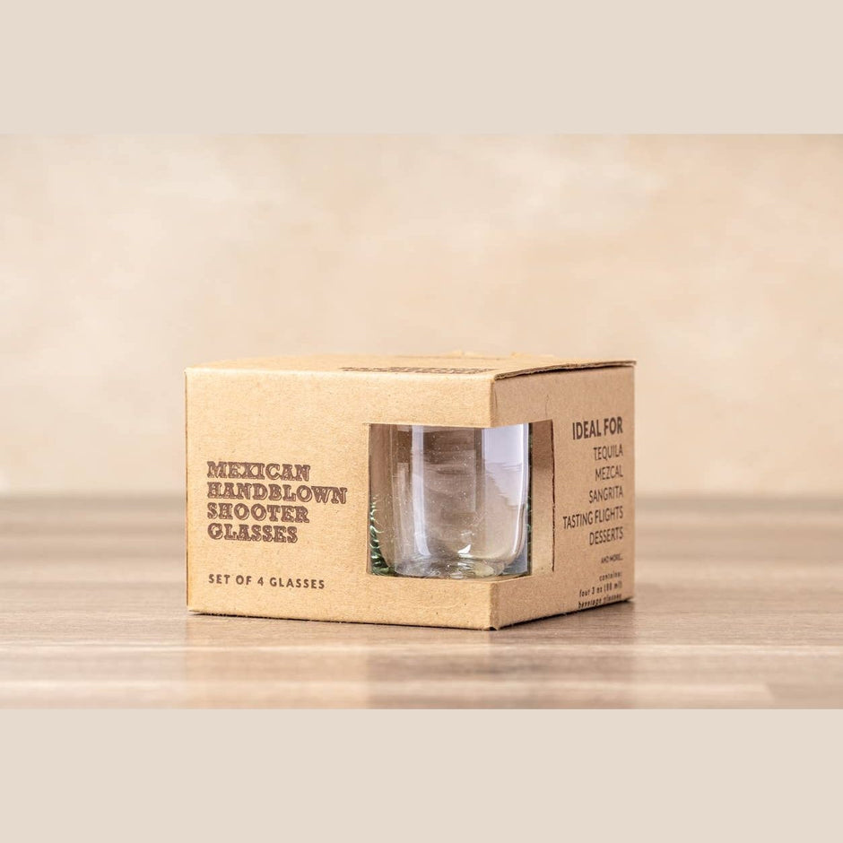 Set of clear handblown Mexican shot glasses by Verve Culture, showcasing their unique glassware craftsmanship.