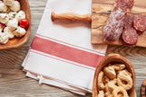 Red herringbone Italian kitchen hand towel by Verve Culture, featuring classic woven design and soft cotton fabric.