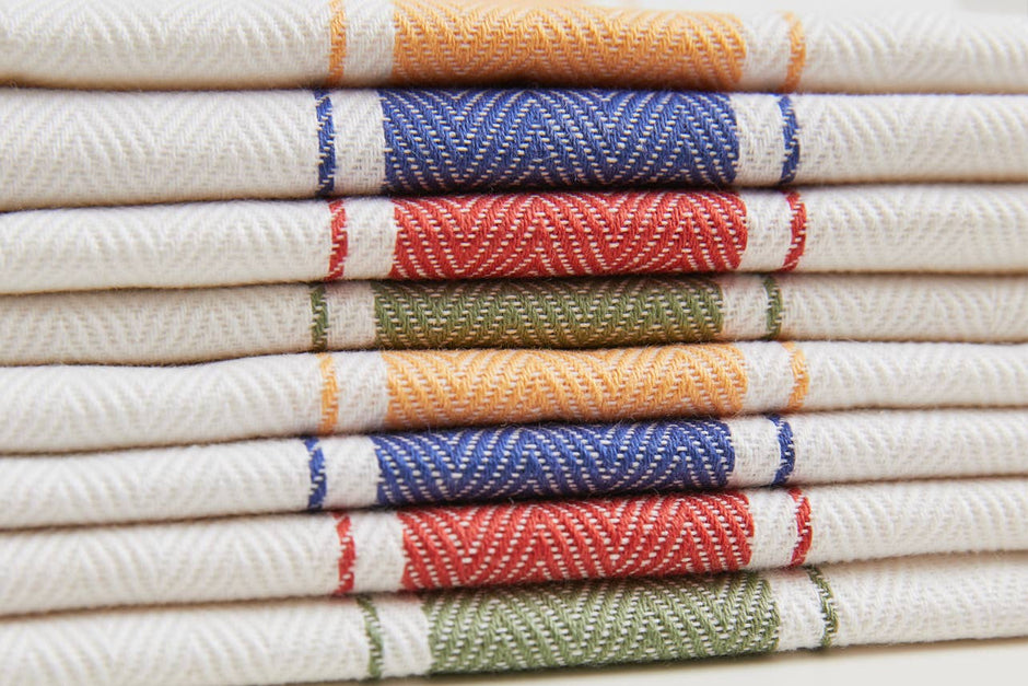 Red herringbone Italian kitchen hand towel by Verve Culture, featuring classic woven design and soft cotton texture.