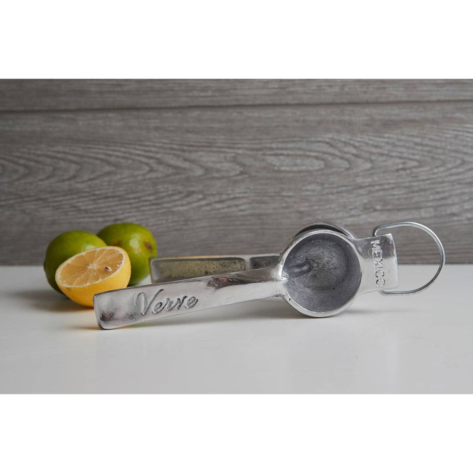 Mexican hand citrus juicer by Verve Culture featuring a traditional wooden design for fresh juice extraction.