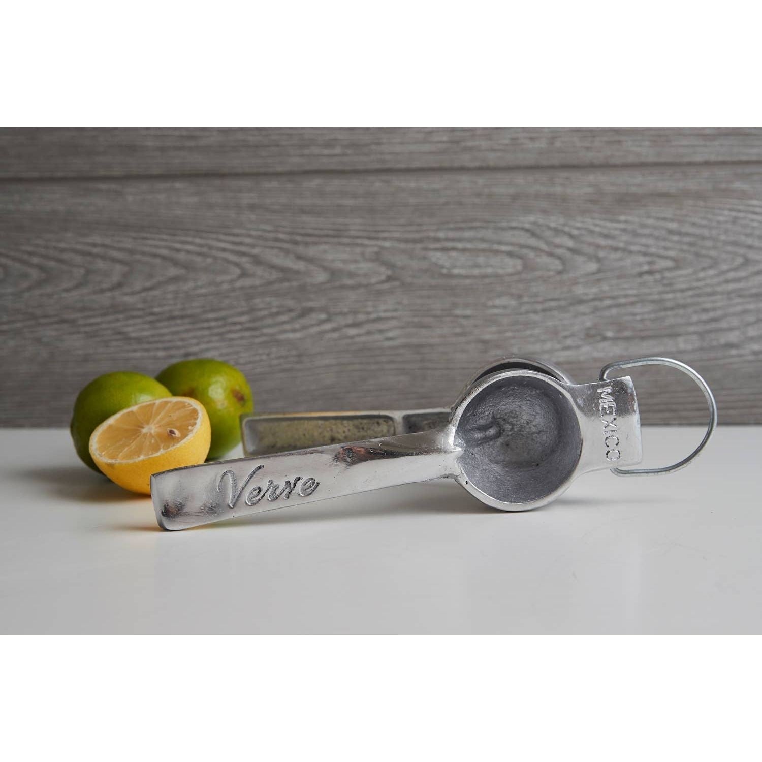 Mexican hand citrus juicer by Verve Culture featuring a traditional wooden design for fresh juice extraction.