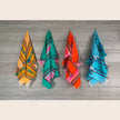Set of four Mexican napkins by Verve Culture featuring vibrant traditional patterns and soft fabric.