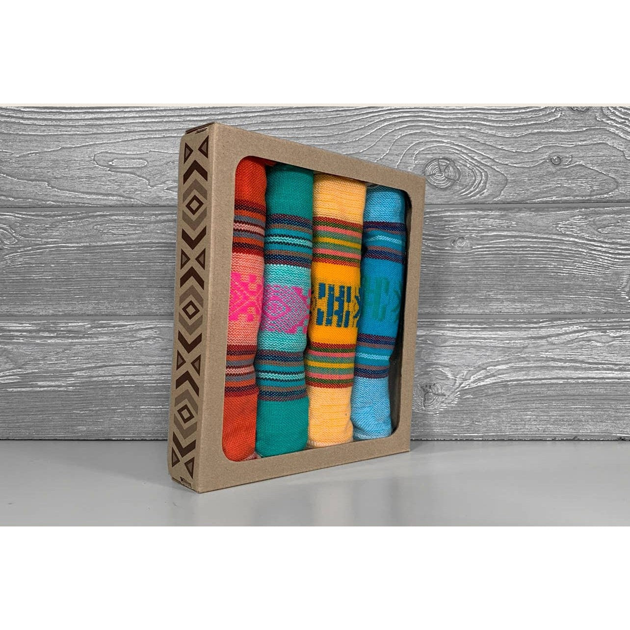 Set of four Mexican napkins by Verve Culture featuring colorful traditional textile patterns.