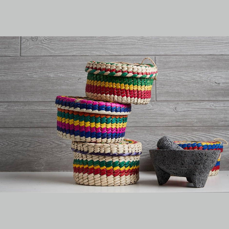 Verve Culture 7-inch molcajete with matching tortilla basket, traditional Mexican kitchenware for preparing and serving tortillas.