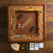 Luxury edition Monopoly game by WS Game Company, featuring elegant game box and classic Monopoly tokens.
