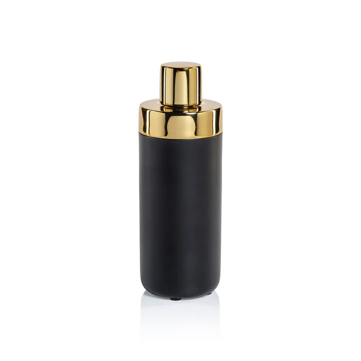 Black and gold Zodax cocktail shaker, bar accessory with a sleek design for mixing drinks in a stylish home bar setup.