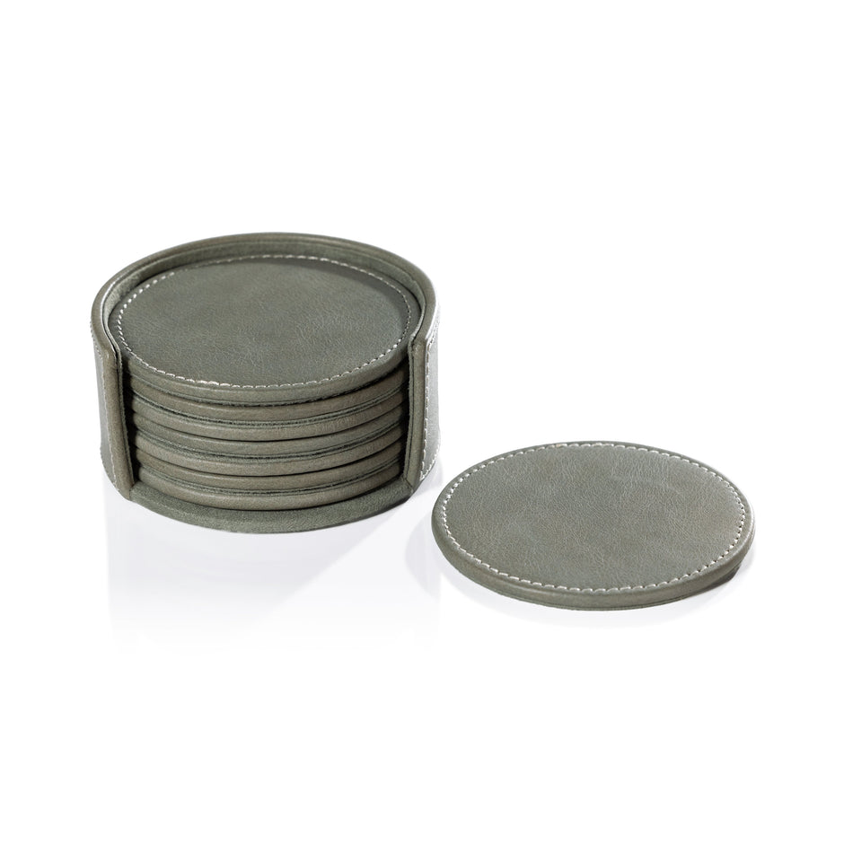 Set of six sage round leather coasters by Zodax, bar accessories with stylish leather design for protecting surfaces.