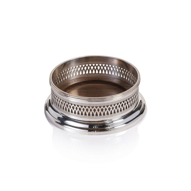 Zodax Sommelier's Edge wine bottle coaster on a bar surface, showcasing elegant bar accessory design.
