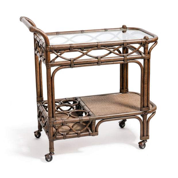 Dark rattan Zodax bar cart with two shelves and metal frame, perfect for stylish beverage storage and display.