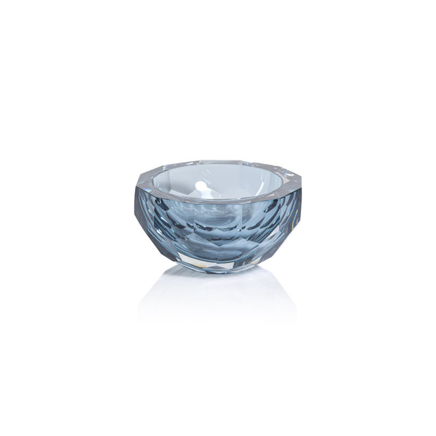 Sky blue Vallées cut glass decor bowl by Zodax, showcasing intricate geometric patterns and a smooth, polished surface.