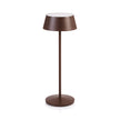 Zodax Andria rechargeable rust table light with a modern, sleek design, perfect for ambient lighting in living spaces.