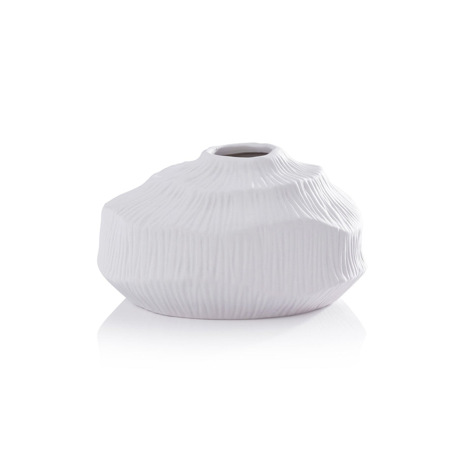 Textured matte white porcelain Zodax vase with a sleek, modern design and smooth surface, ideal for decorative floral arrangements.
